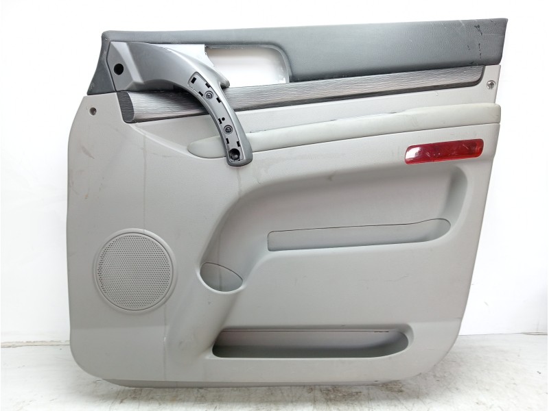 Recambio de guarnecido puerta delantera derecha para ssangyong rodius line referencia OEM IAM 7220121000  