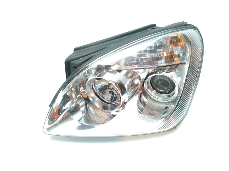 Recambio de faro izquierdo para kia carens 2.0 crdi referencia OEM IAM 921011D020  